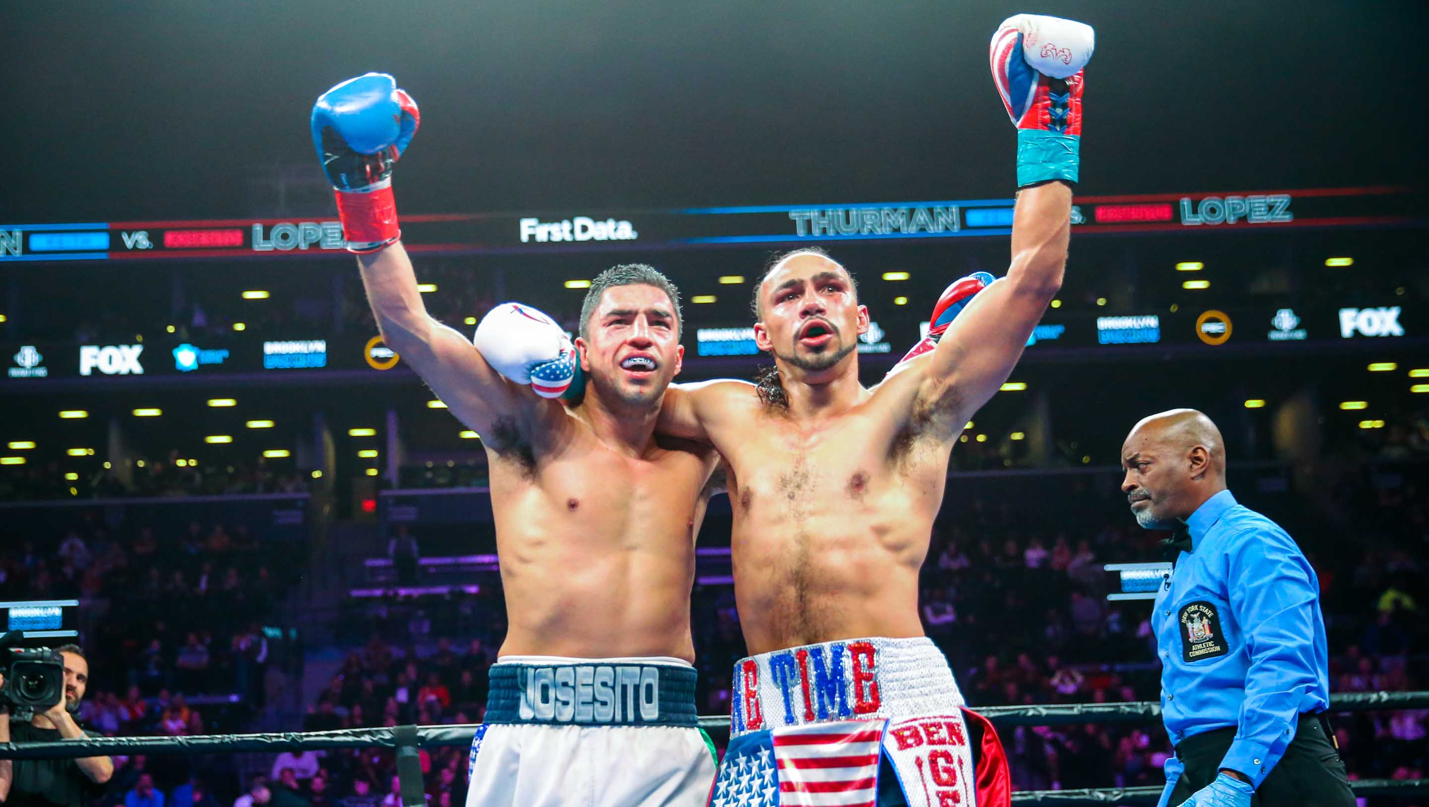 Thurman and Lopez celebrate a great fight